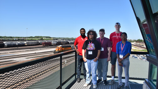 Group photo overlooking BNSF railyard.