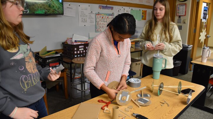 Mickle Middle School students building a car