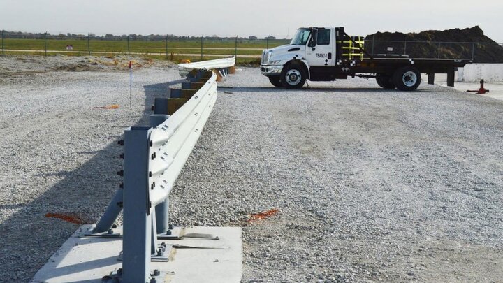 Flatbed truck crashed into barrier